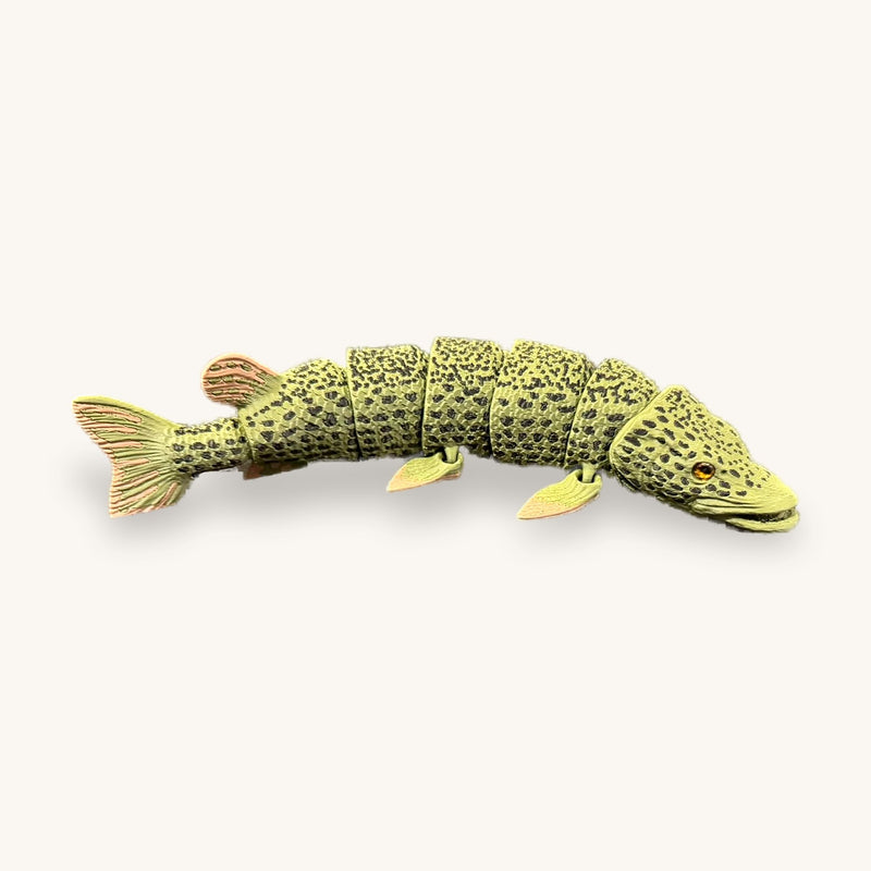3D-printed articulated pike, speckled olive and cream, curved on a plain background